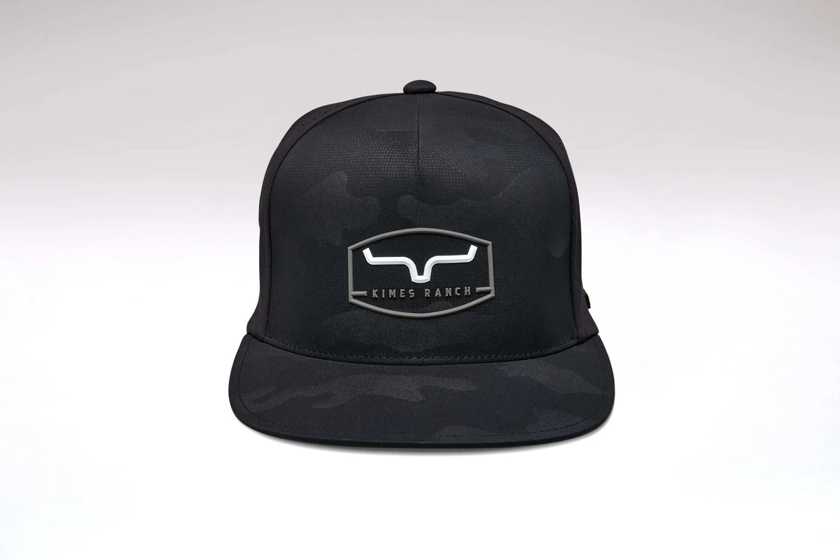 Kimes Ranch Creston Black Camo hat with a flat brim and the Kimes Ranch logo on the front