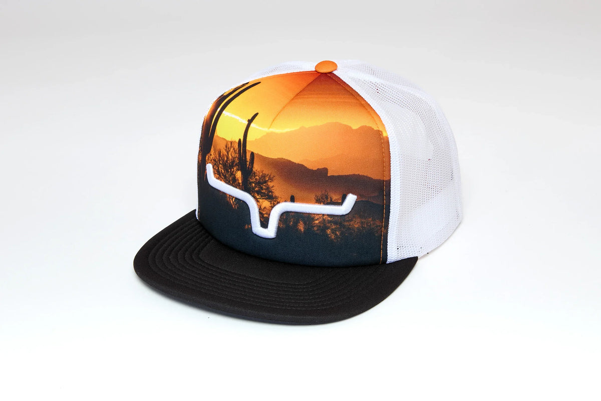Kimes Ranch Crestview, side view, hat with a sunset desert scene and white Kimes Ranch logo on the front panel