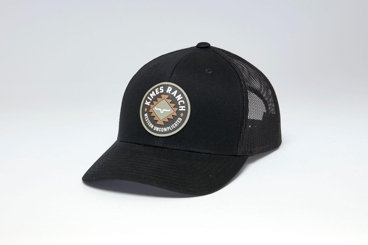 Kimes Ranch Vaughn, side view, Black trucker hat with mesh back and embroidered logo patch