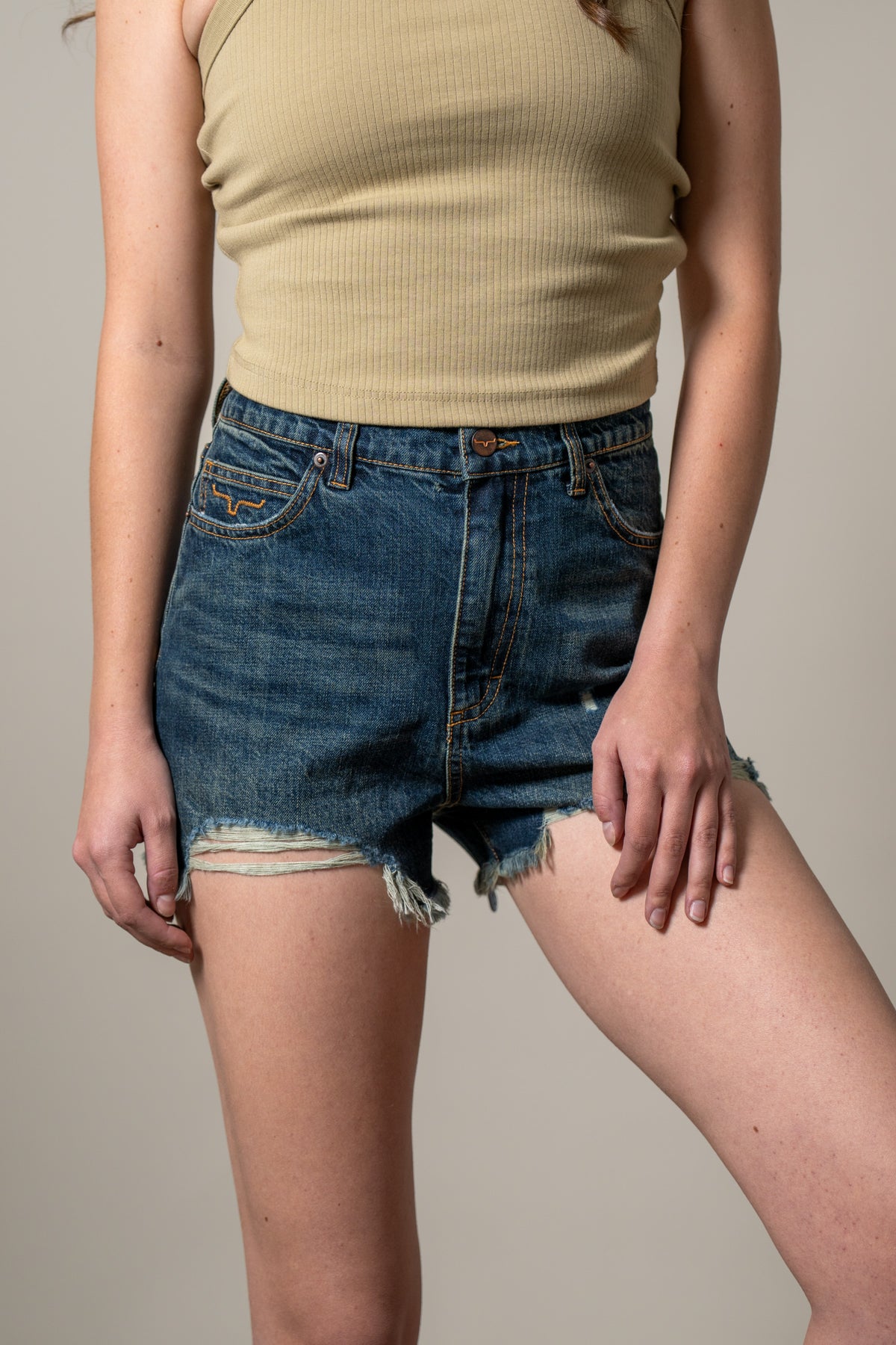 Kimes Ranch Daisy Dark Wash jeans with front pockets and a frayed hem