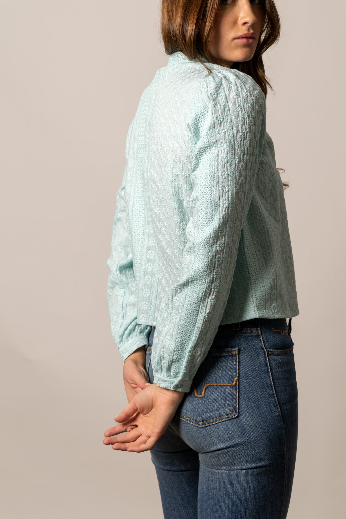 Kimes Ranch Daisychain top in Ice Blue, side view, with long sleeves and a textured floral pattern
