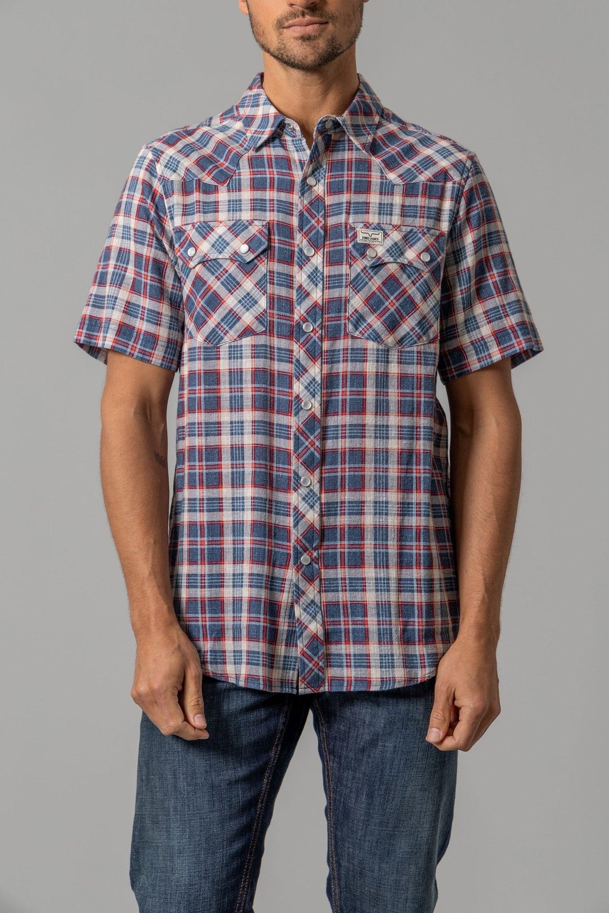 Kimes Ranch Danford short sleeve dress shirt in Blue plaid with snap button pockets and logo patch