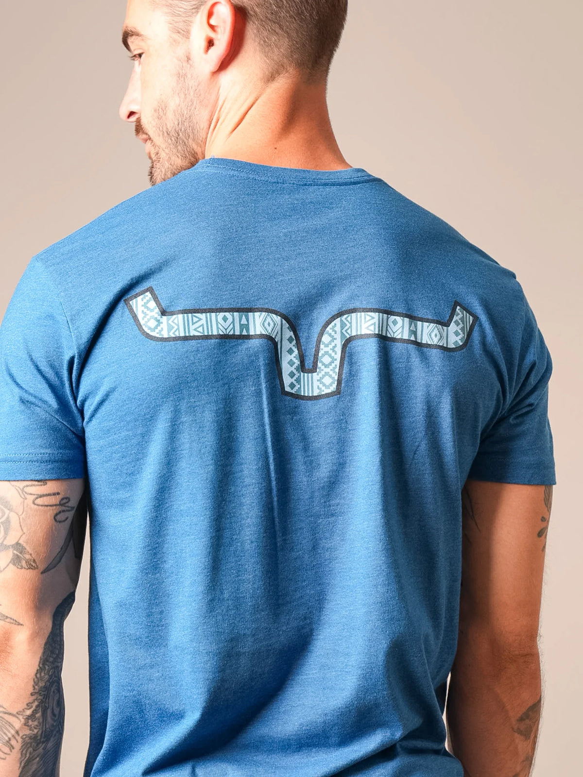 Kimes Ranch Delano shirt in Marine Blue, back view, with a geometric patterned graphic on the back
