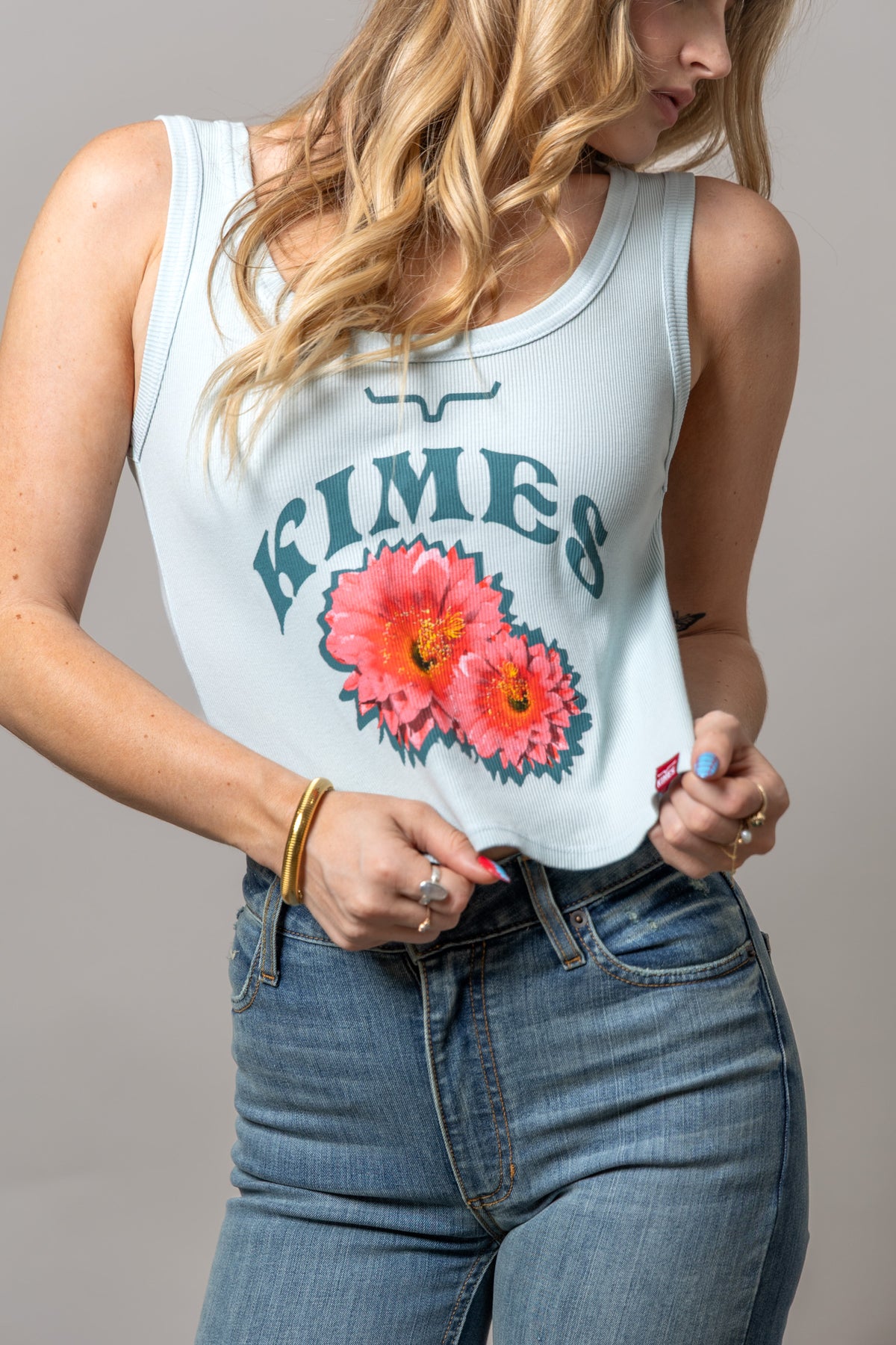 Kimes Ranch Desert Rose shirt in Ice Blue with a graphic of two pink flowers and the brand name