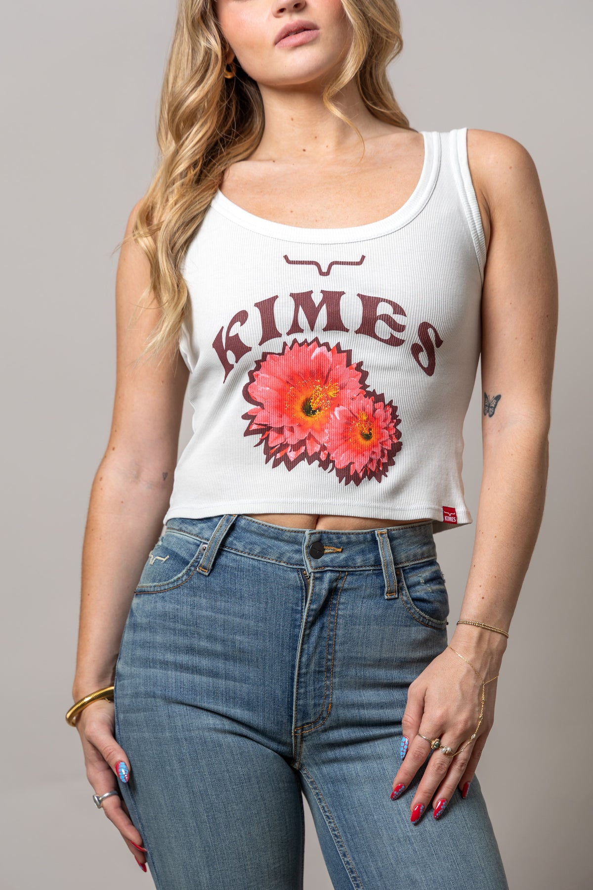 Kimes Ranch Desert Rose Natural ribbed tank top with maroon Kimes Ranch logo and pink floral graphic