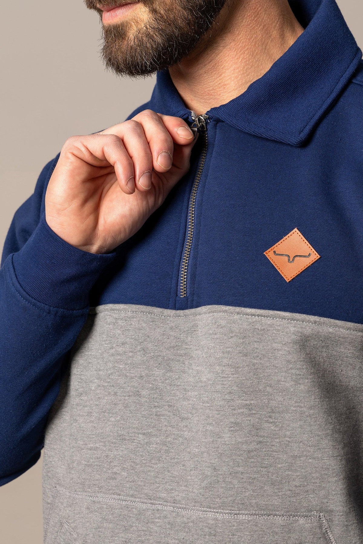 Kimes Ranch Diamond Head QZ Sweatshirt in Navy And Grey with a close-up of the collar and logo