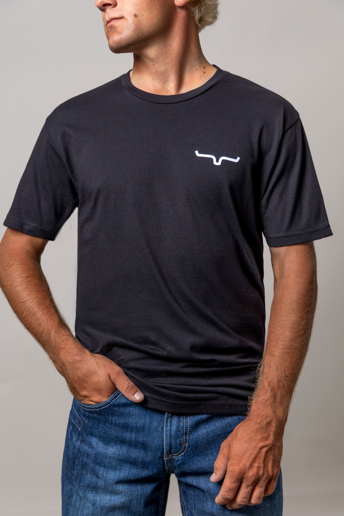 Kimes Ranch Dillard Floral short sleeve shirt in Black with the Kimes Ranch logo on the chest