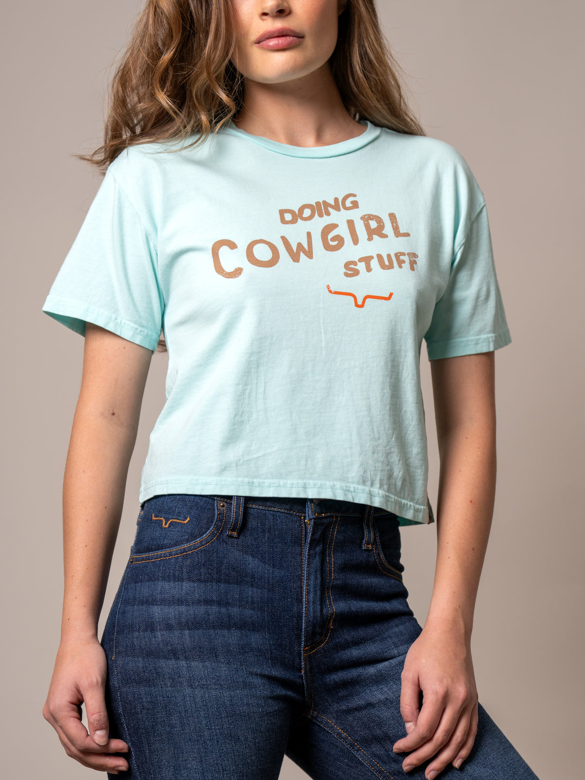 Kimes Ranch Doing Cowgirl Stuff shirt in Mint with short sleeves and a graphic print