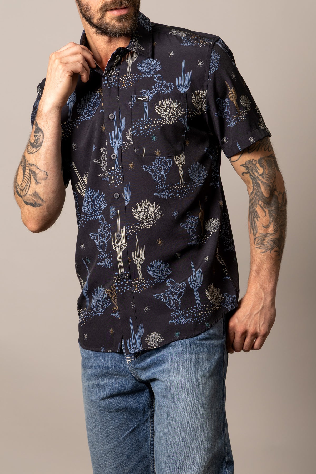 Kimes Ranch Dunn Black short sleeve dress shirt with a desert cactus print and a chest pocket