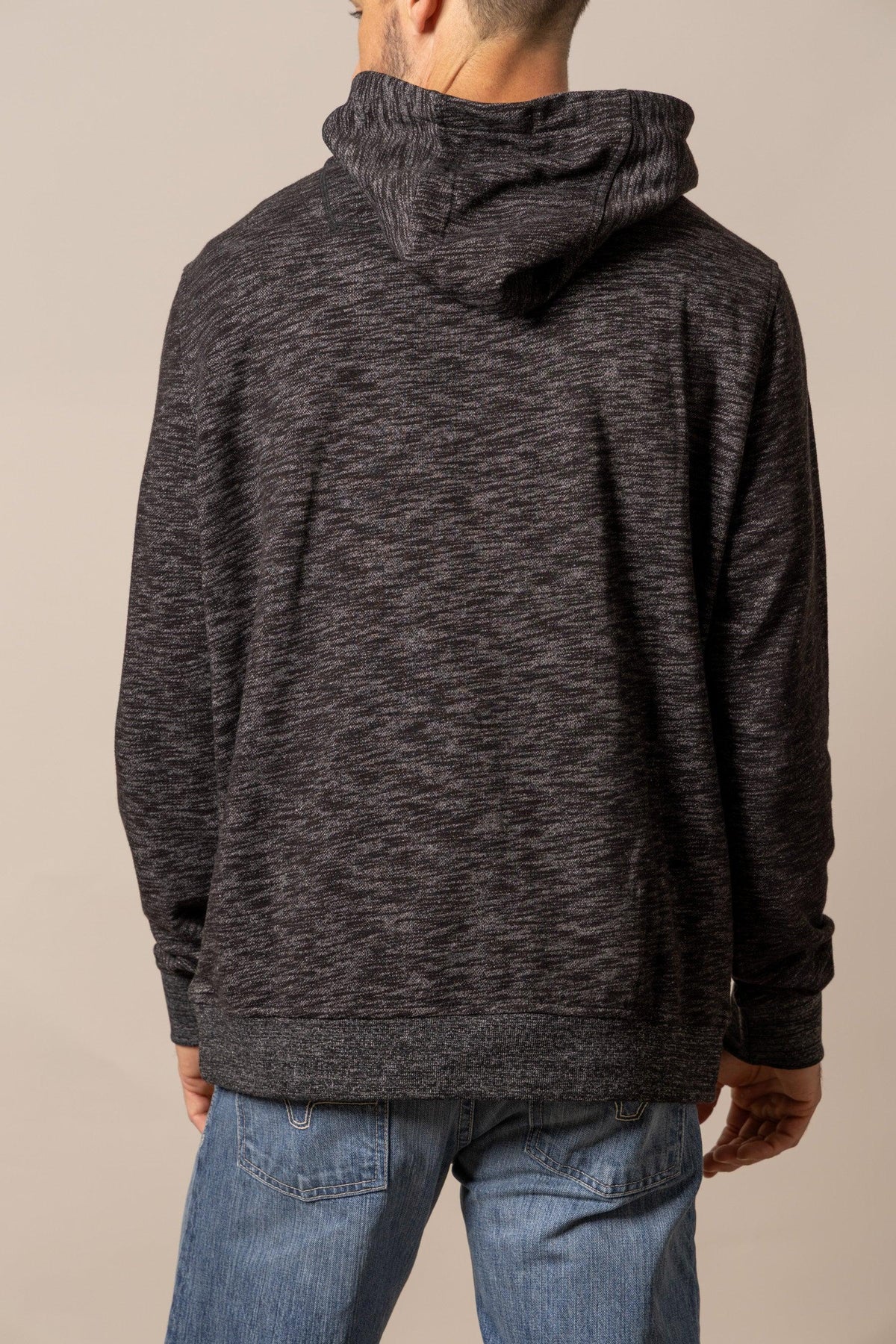 Kimes Ranch Durham Hoodie in Black, back view, with a heathered texture and a relaxed fit