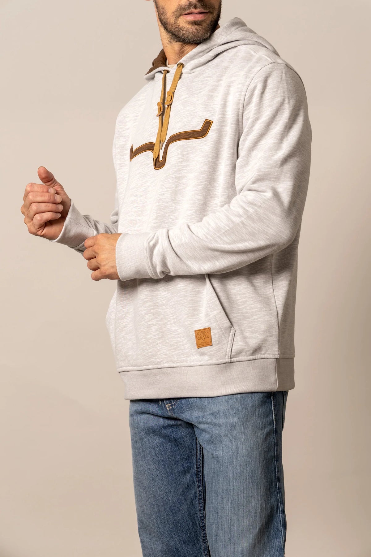 Kimes Ranch Durham Hoodie in Natural, side view, with a longhorn logo and drawstrings