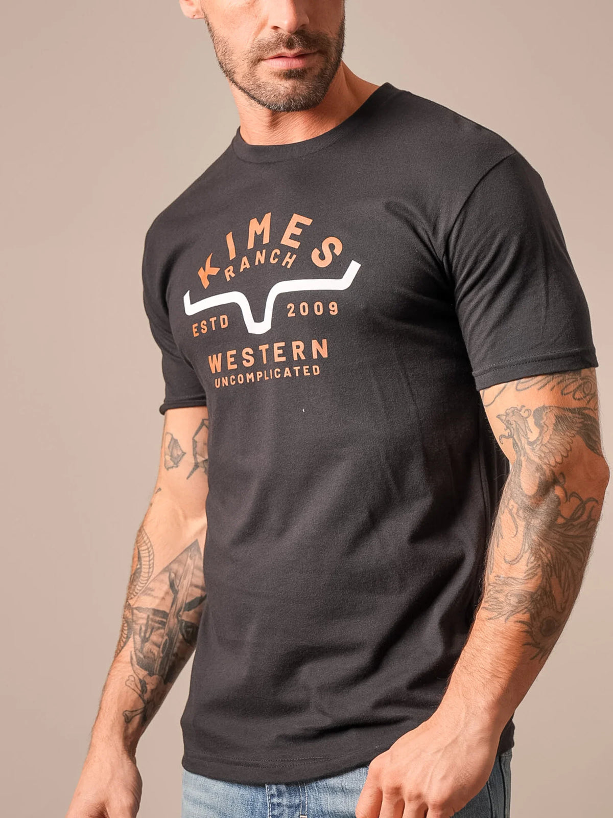 Kimes Ranch Easy Does It shirt in Black with a graphic featuring the Kimes Ranch logo and text reading Western Uncomplicated