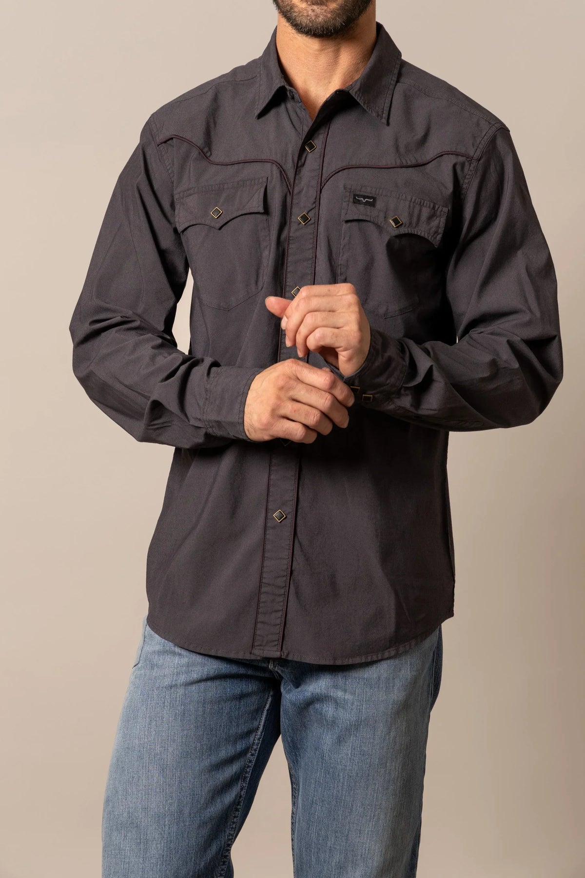 Kimes Ranch El Toro Black long sleeve dress shirt with contrast stitching and diamond-shaped buttons