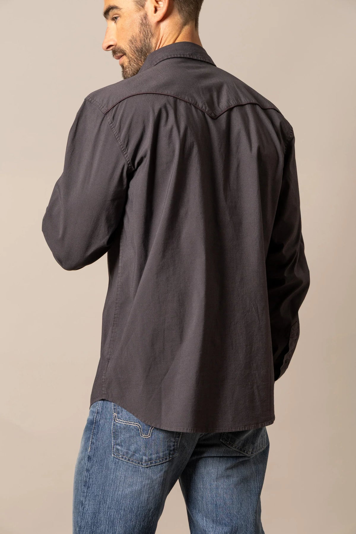 Kimes Ranch El Toro dress shirt in Black, back view, with a back yoke and long sleeves