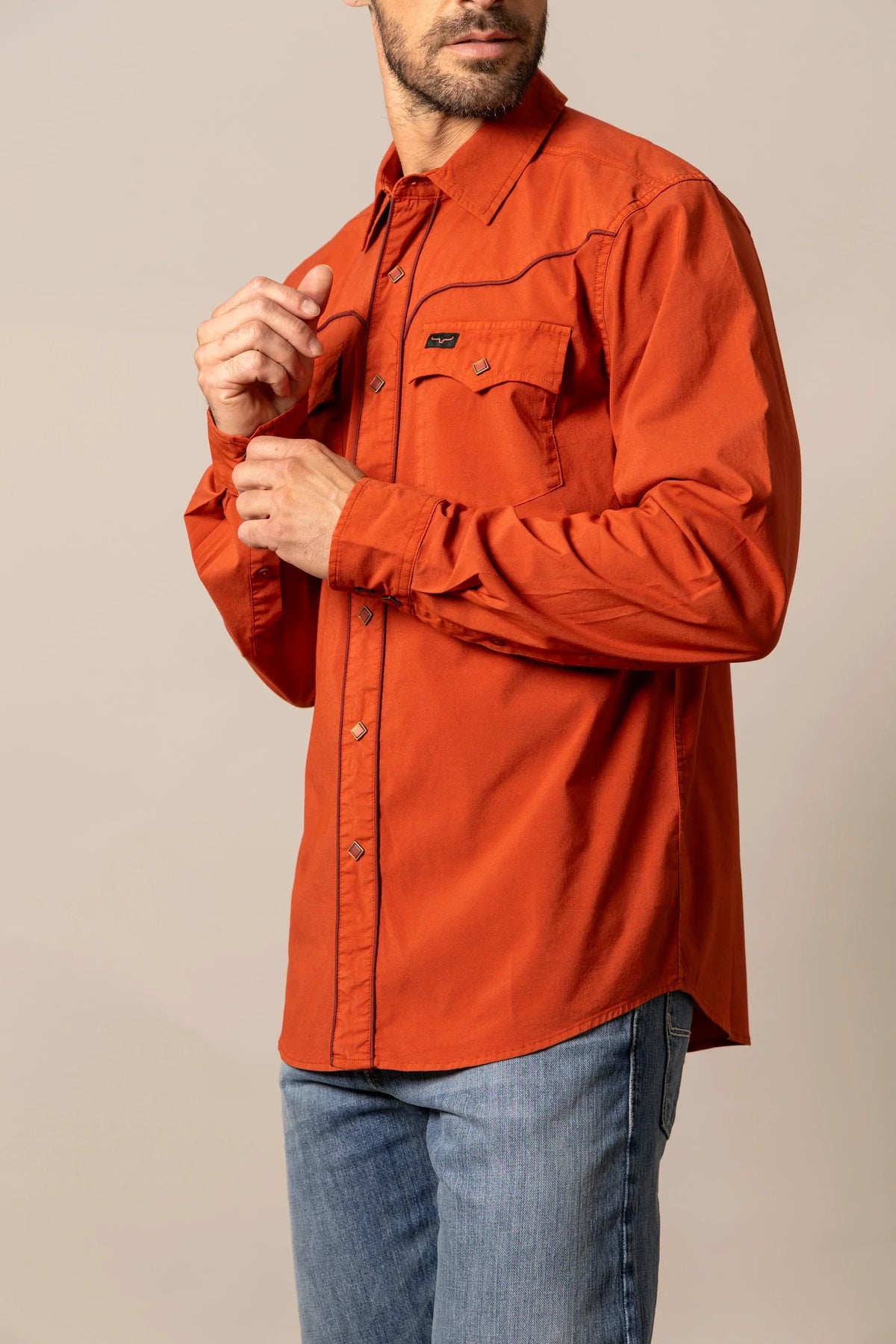 Kimes Ranch El Toro dress shirt in Brick Red, side view, with western yoke and chest pocket