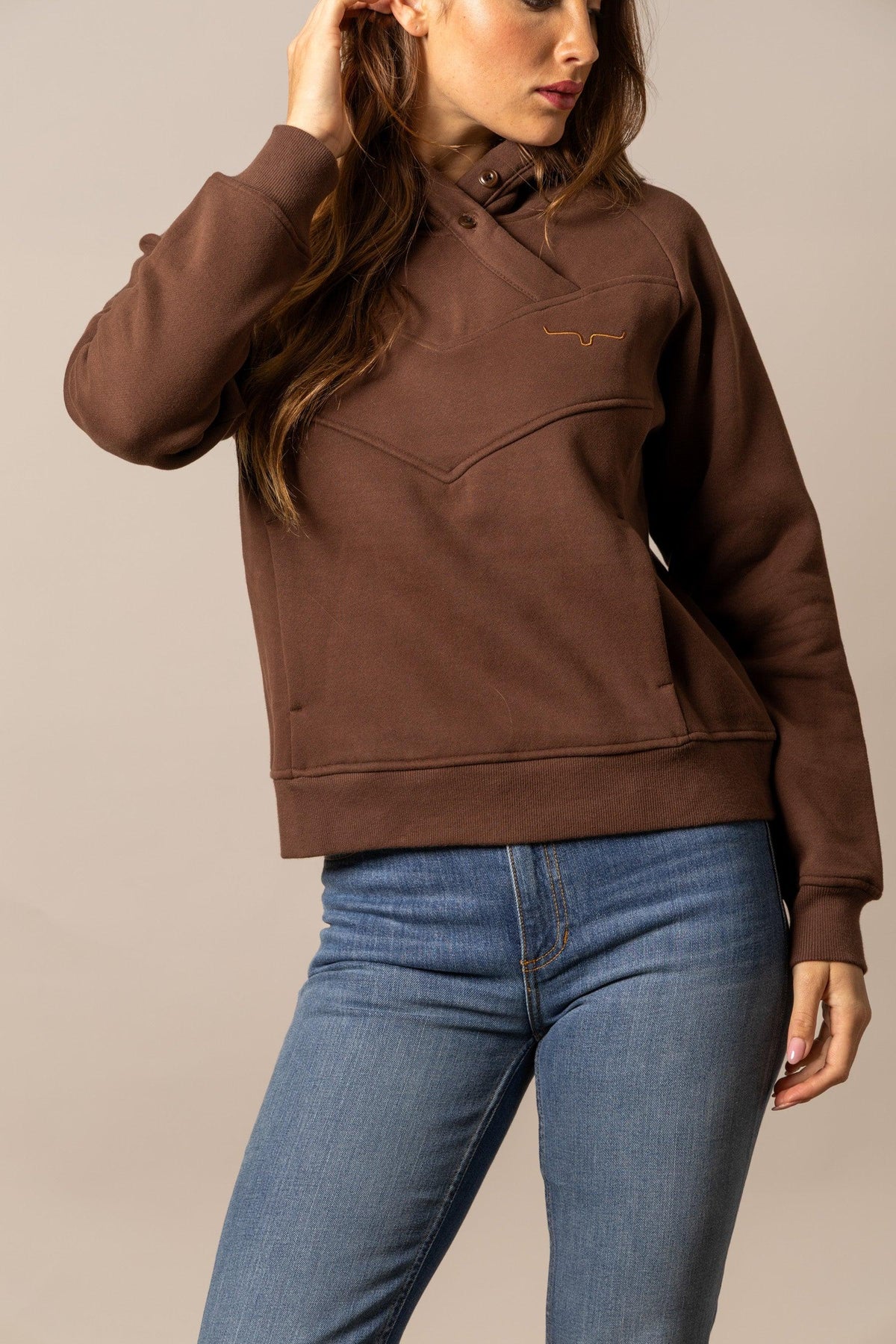 Kimes Ranch Ella hoodie in Brown with a half-button placket and the Kimes Ranch logo embroidered on the chest