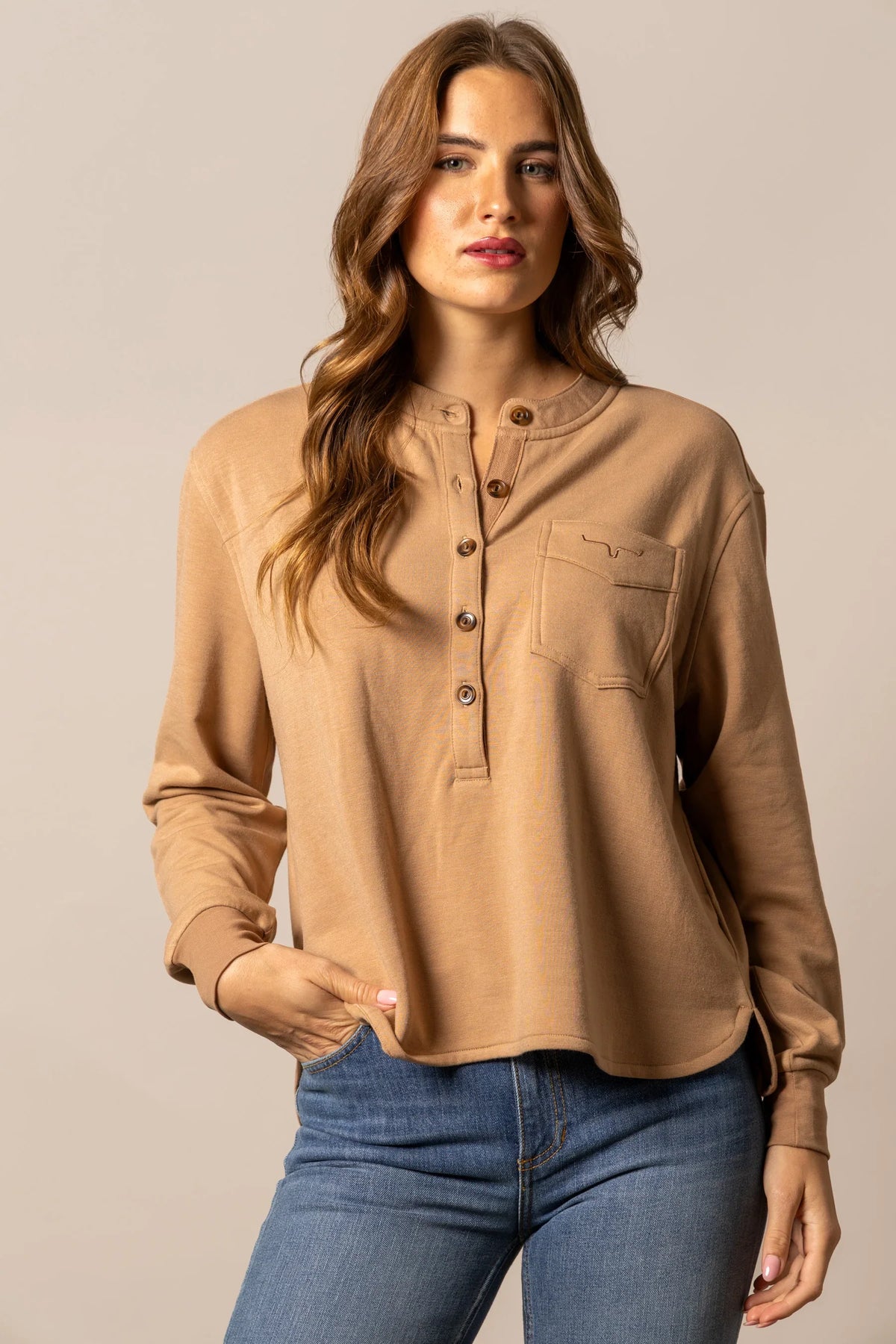 Kimes Ranch Elouise Henley sweater in Brown with a button placket and chest pocket with logo