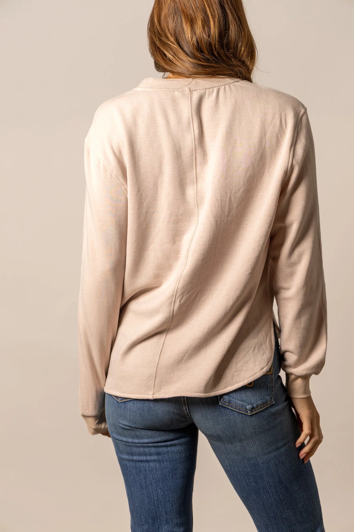Kimes Ranch Elouise Henley sweater in Natural, back view, with a back yoke seam and long sleeves