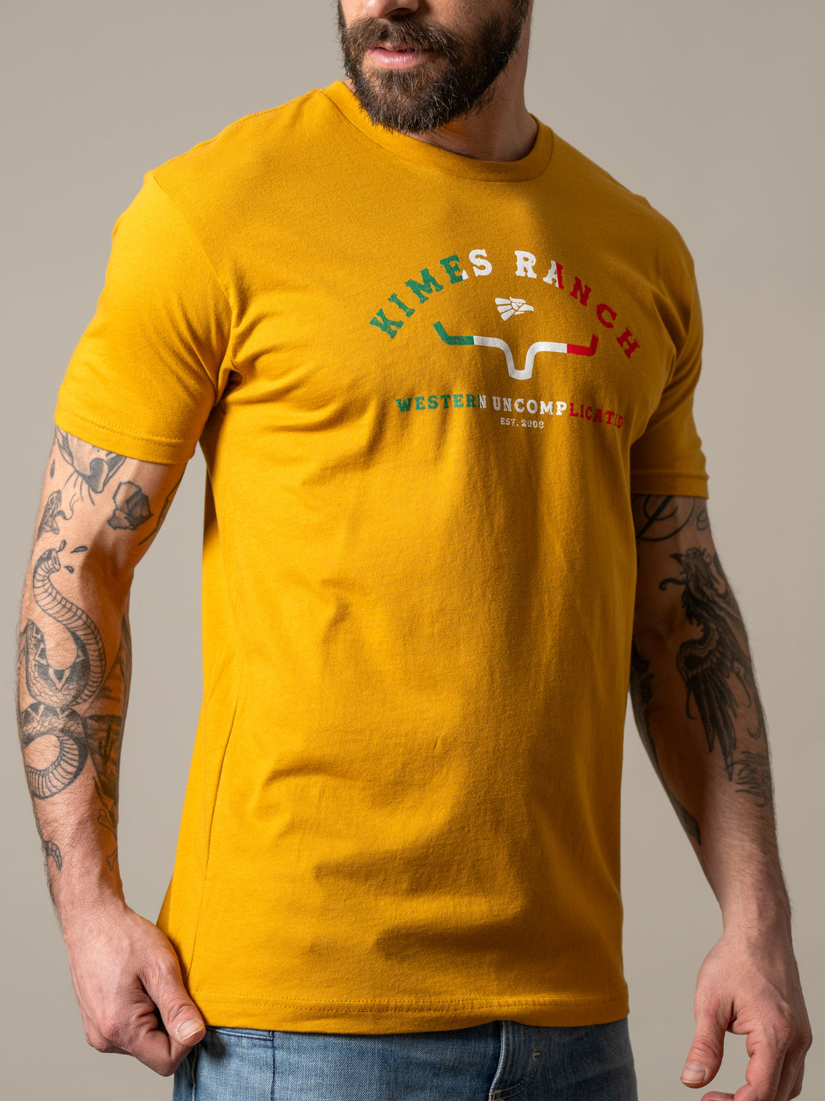 Kimes Ranch Establecido En 2009 shirt in Antique Gold with a graphic featuring a steer horn