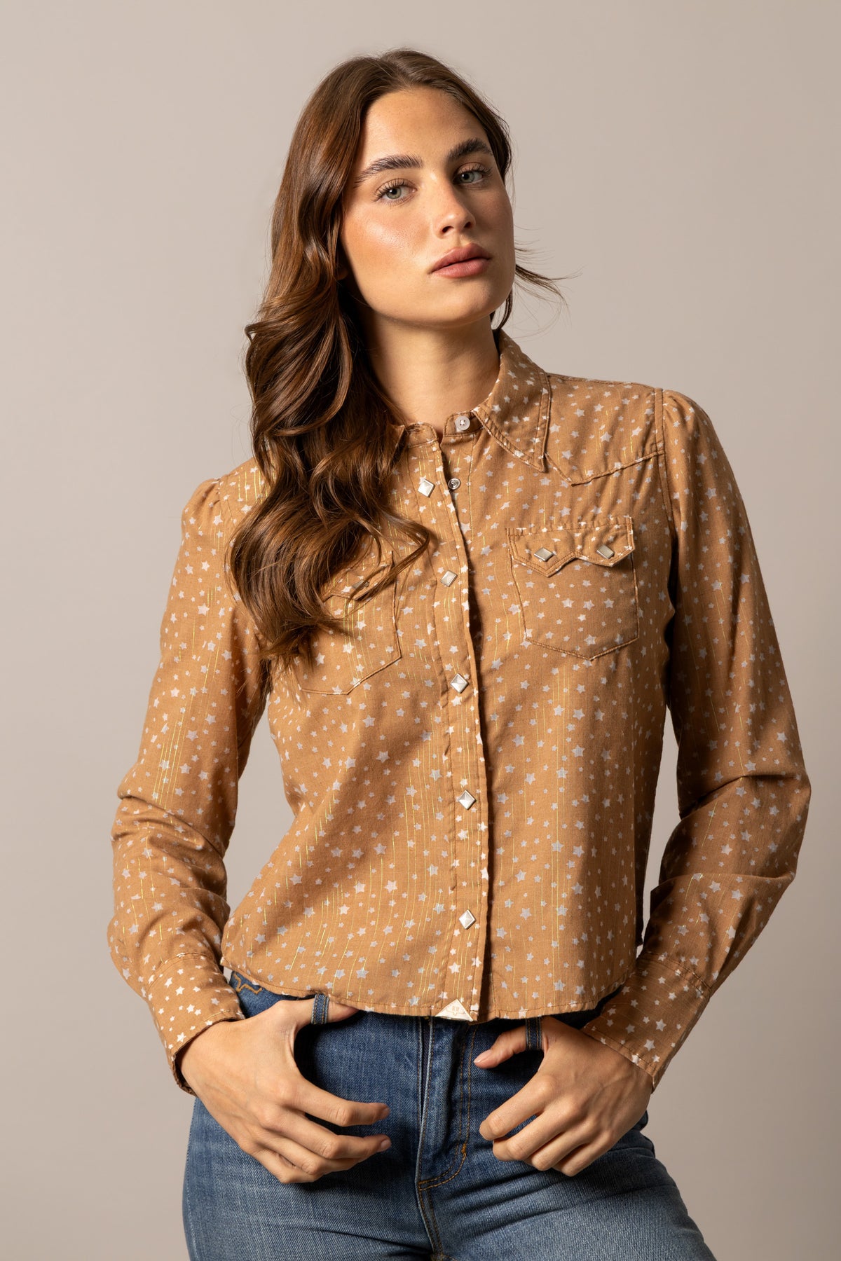 Kimes Ranch Etoile top in Tobacco with a white star print, snap front closure, and western yoke
