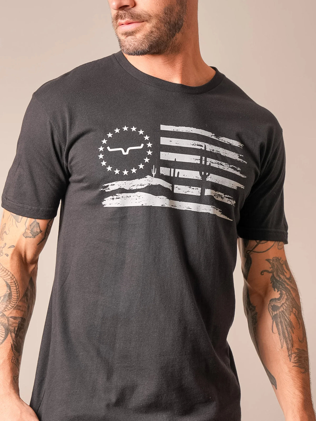 Kimes Ranch Faded shirt in Black with a distressed desert flag graphic featuring a steer logo and cacti