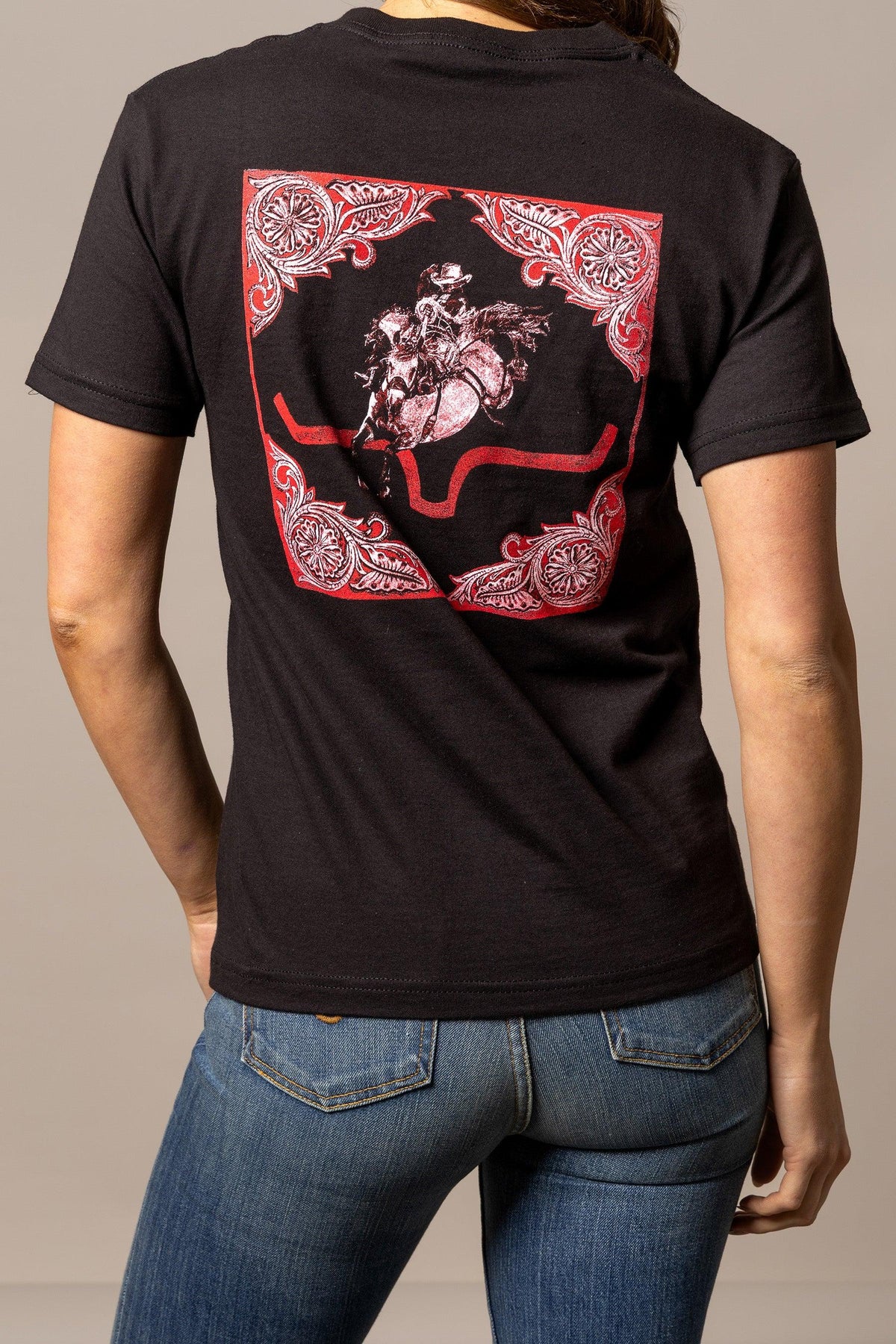 Kimes Ranch Fallon Bandana shirt in Black, back view, with a back graphic of a rodeo rider in a red