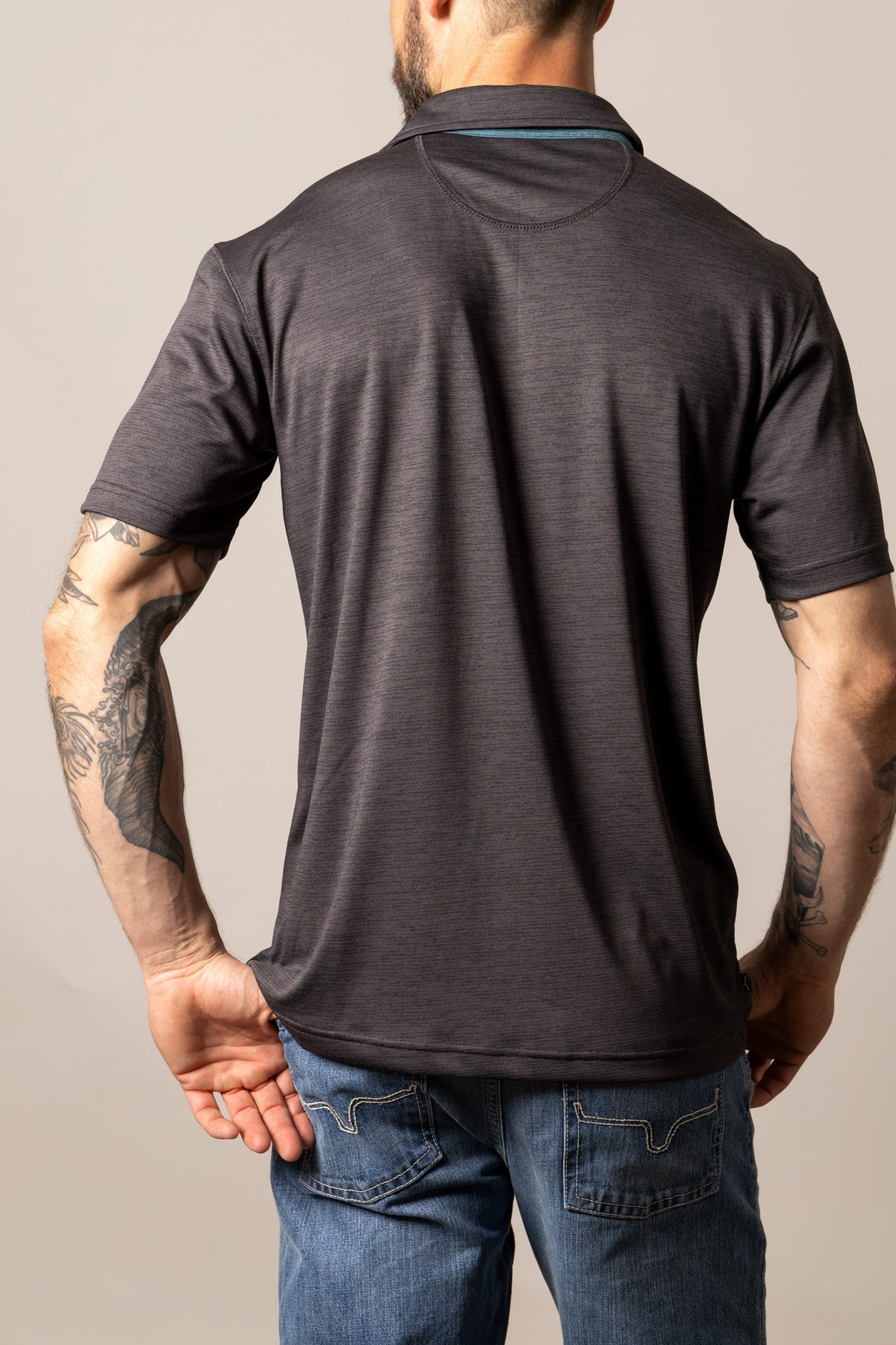 Kimes Ranch Fletcher polo in Black, back view, with a back yoke and short sleeves