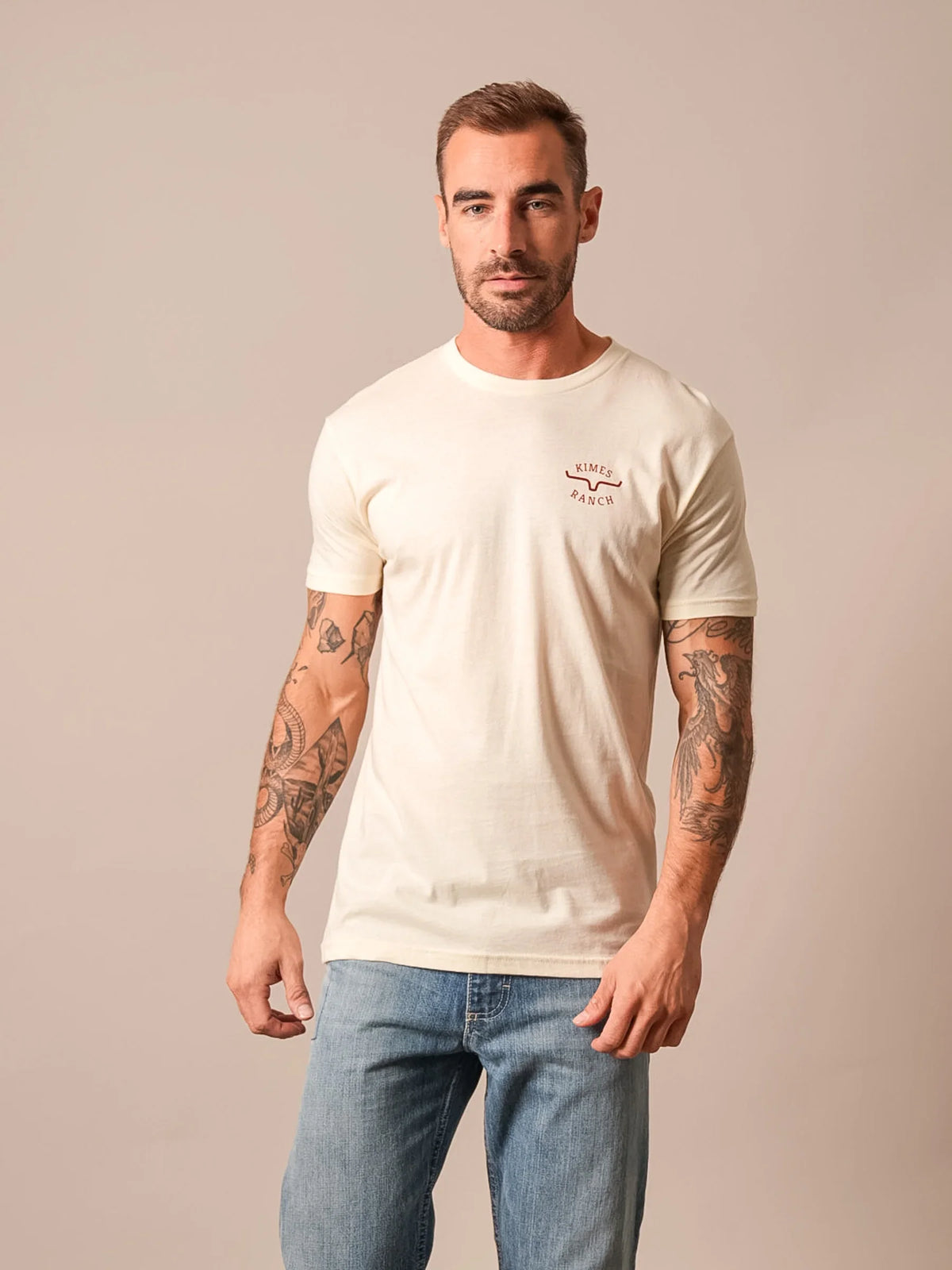 Kimes Ranch Flying High short sleeve crewneck shirt in Natural with the Kimes Ranch logo on the chest