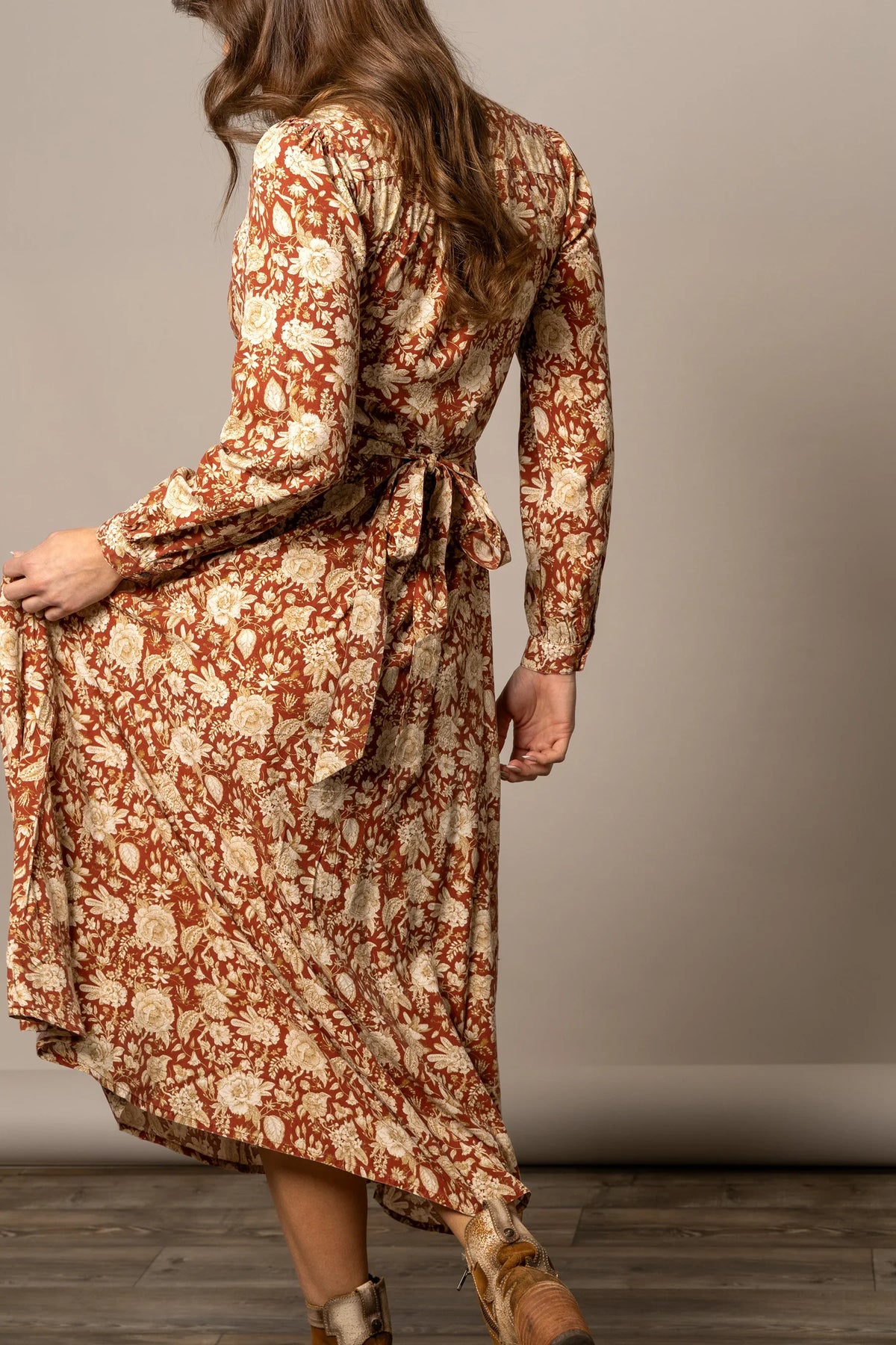 Kimes Ranch Georgia dress in Burnt Red, back view, with a floral print and a tie waist