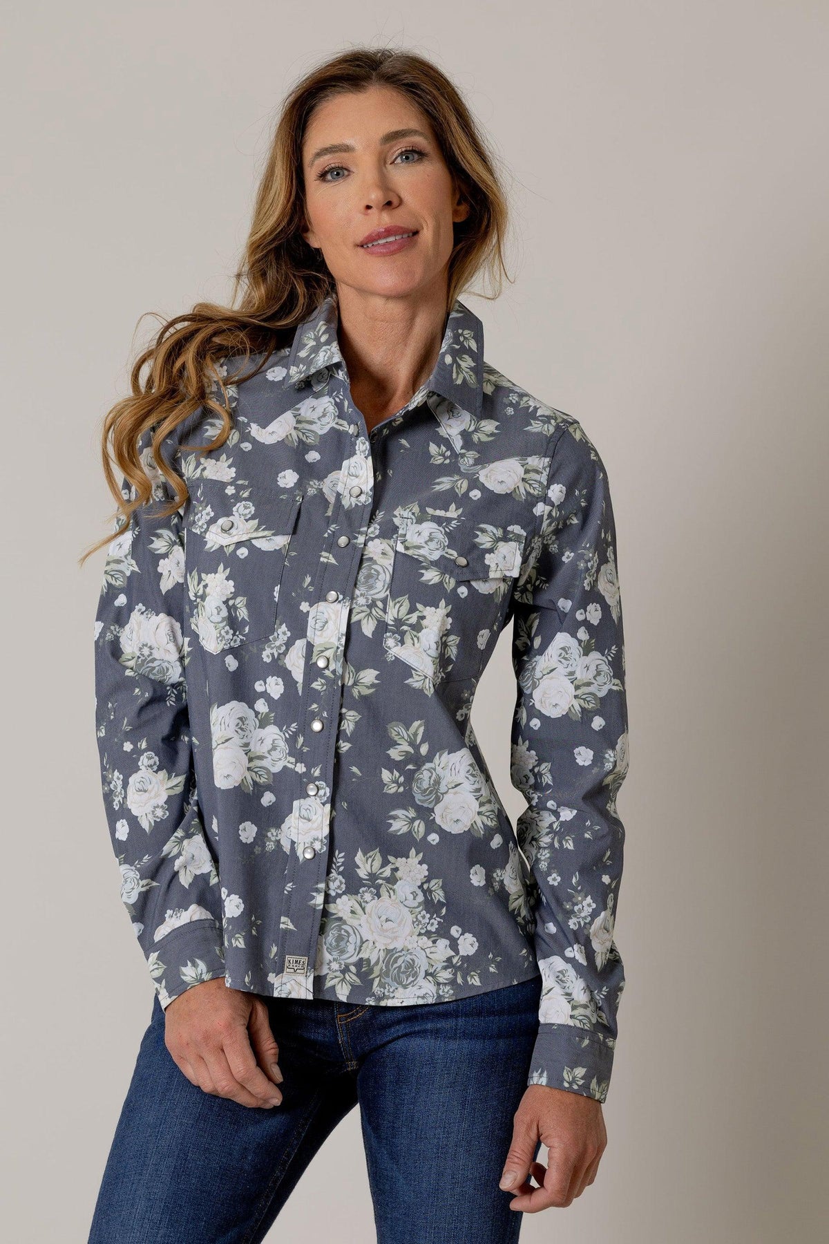 Kimes Ranch Ginny Snap top in Blue with a white floral print and snap front closure