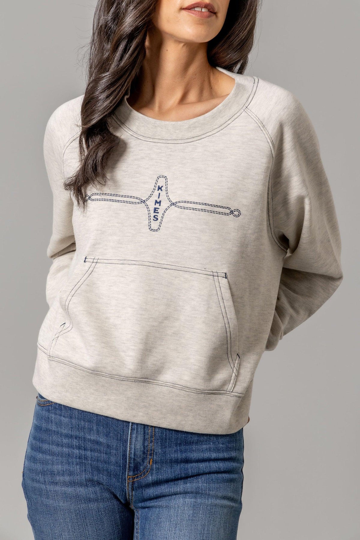 Kimes Ranch Gracie Cropped Crewneck sweatshirt in Light Grey with a front kangaroo pocket and blue contrast stitching