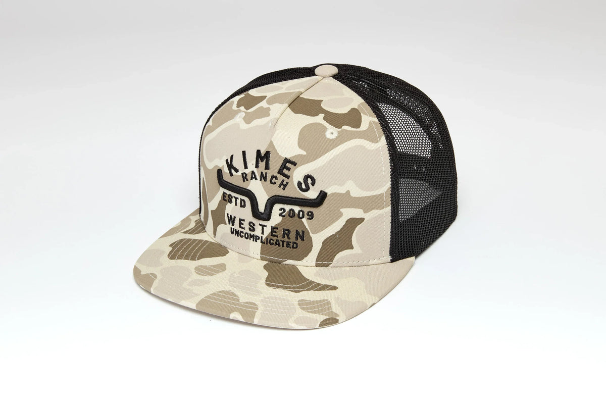 Kimes Ranch Grandview Trucker hat in Natural, side view, with a camouflage pattern and a black mesh back