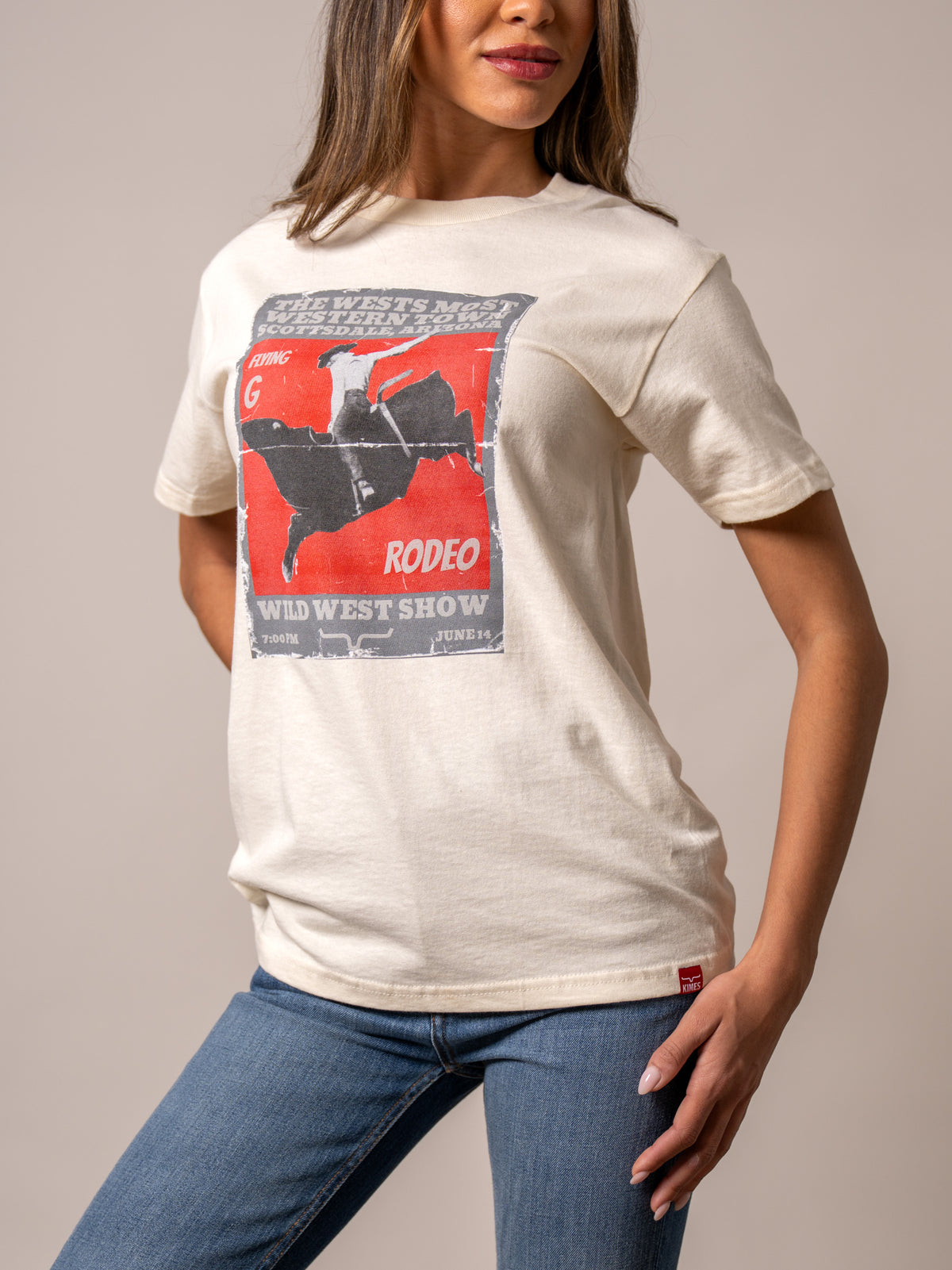Kimes Ranch Ladies Greg 1950 shirt in Cream with a vintage rodeo graphic featuring a cowboy on a bull