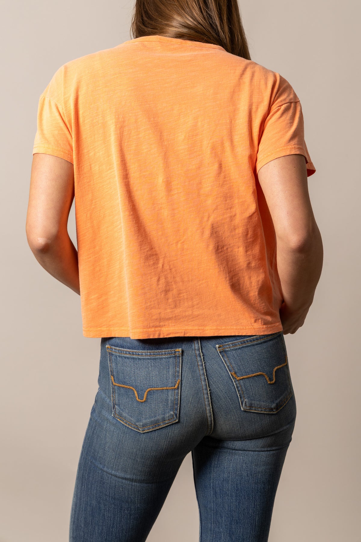 Kimes Ranch Hayloft shirt in Orange, back view, with short sleeves and a relaxed fit
