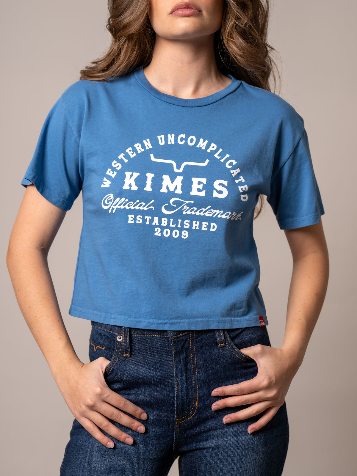 Kimes Ranch Heavy Text shirt in Carbon Blue with a white Western Uncomplicated logo and Established 2009 text