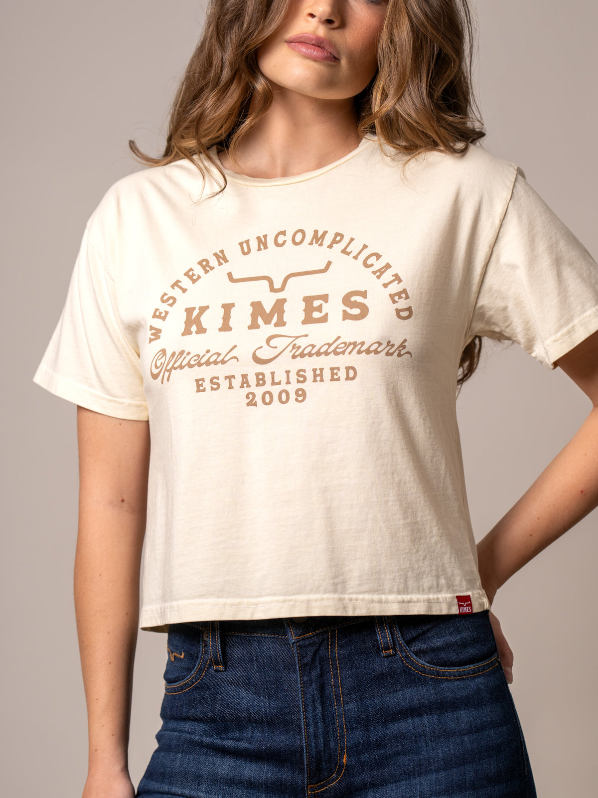 Kimes Ranch Heavy Text shirt in Ivory with a Western Uncomplicated Official Trademark Established 2009 graphic print