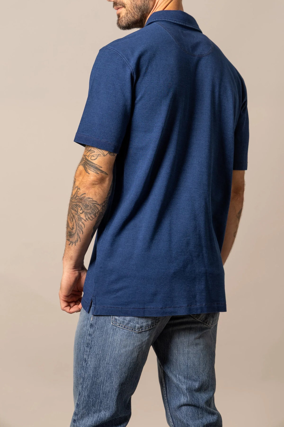 Kimes Ranch Holbrook Polo in Indigo, back view, with a back yoke and short sleeves