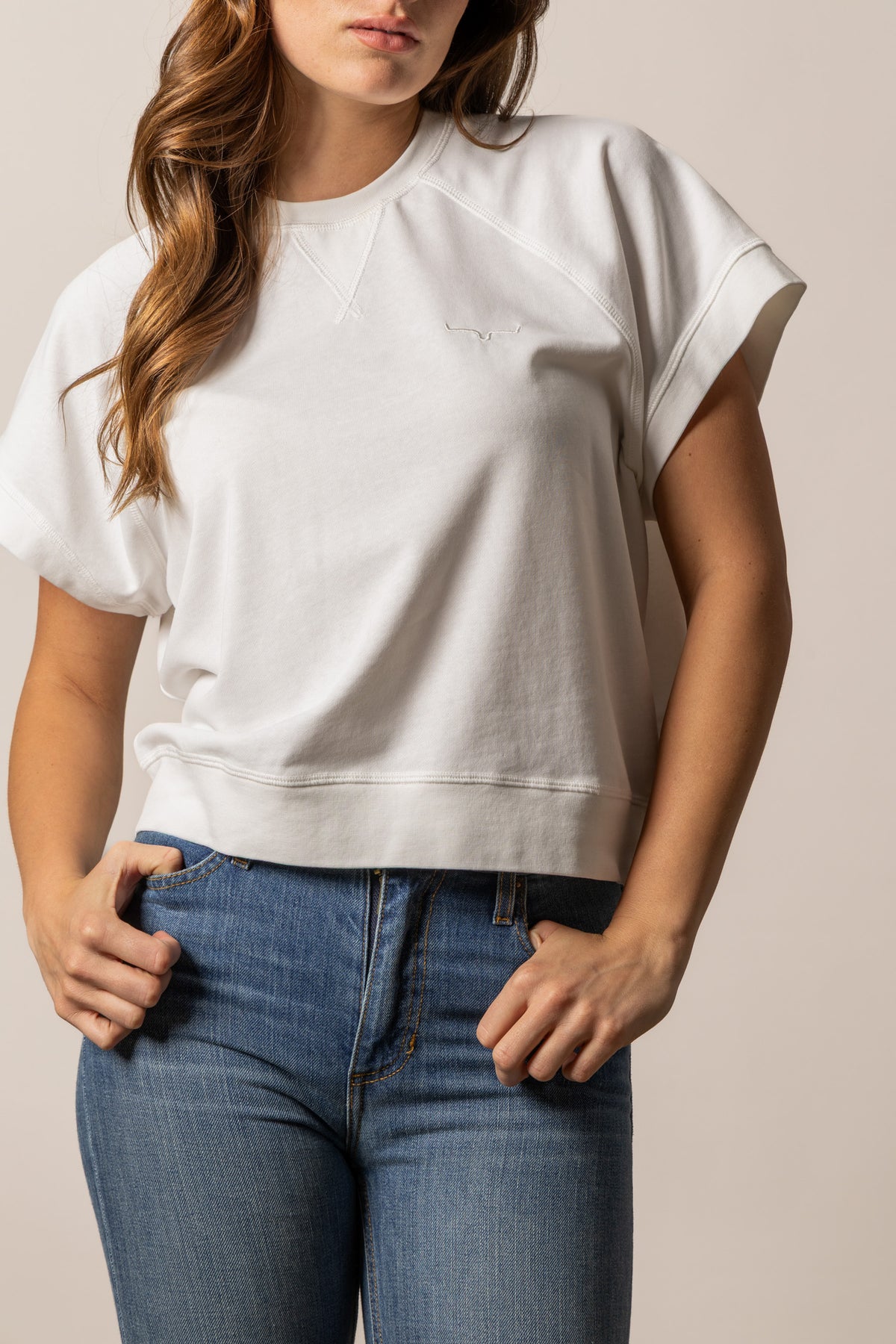 Kimes Ranch Holly sweatshirt in Pristine with a crewneck, rolled short sleeves, and a small logo on the chest