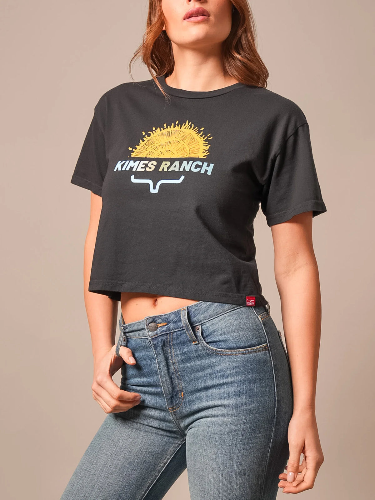 Kimes Ranch Home Grown Black short sleeve shirt with a yellow sunburst graphic and the Kimes Ranch logo