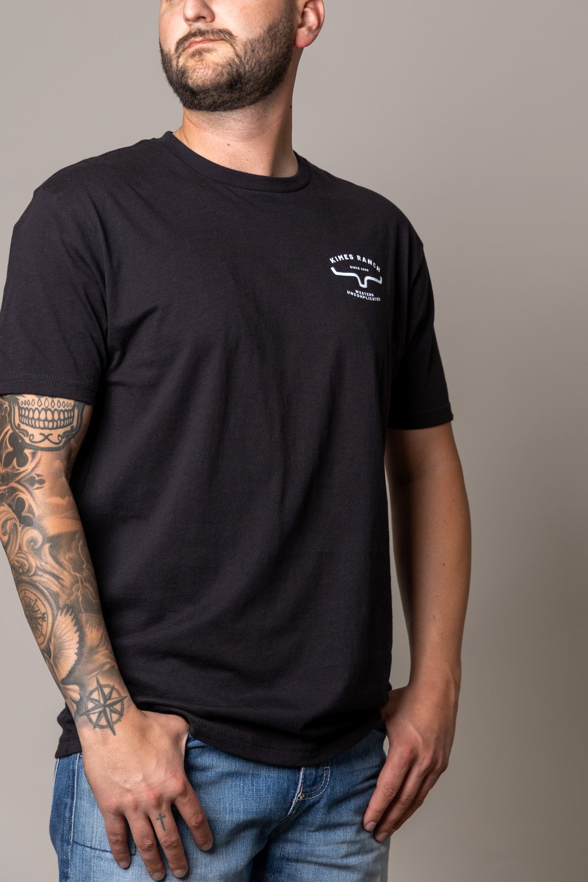 Kimes Ranch Honor shirt in Black with a chest logo and short sleeves