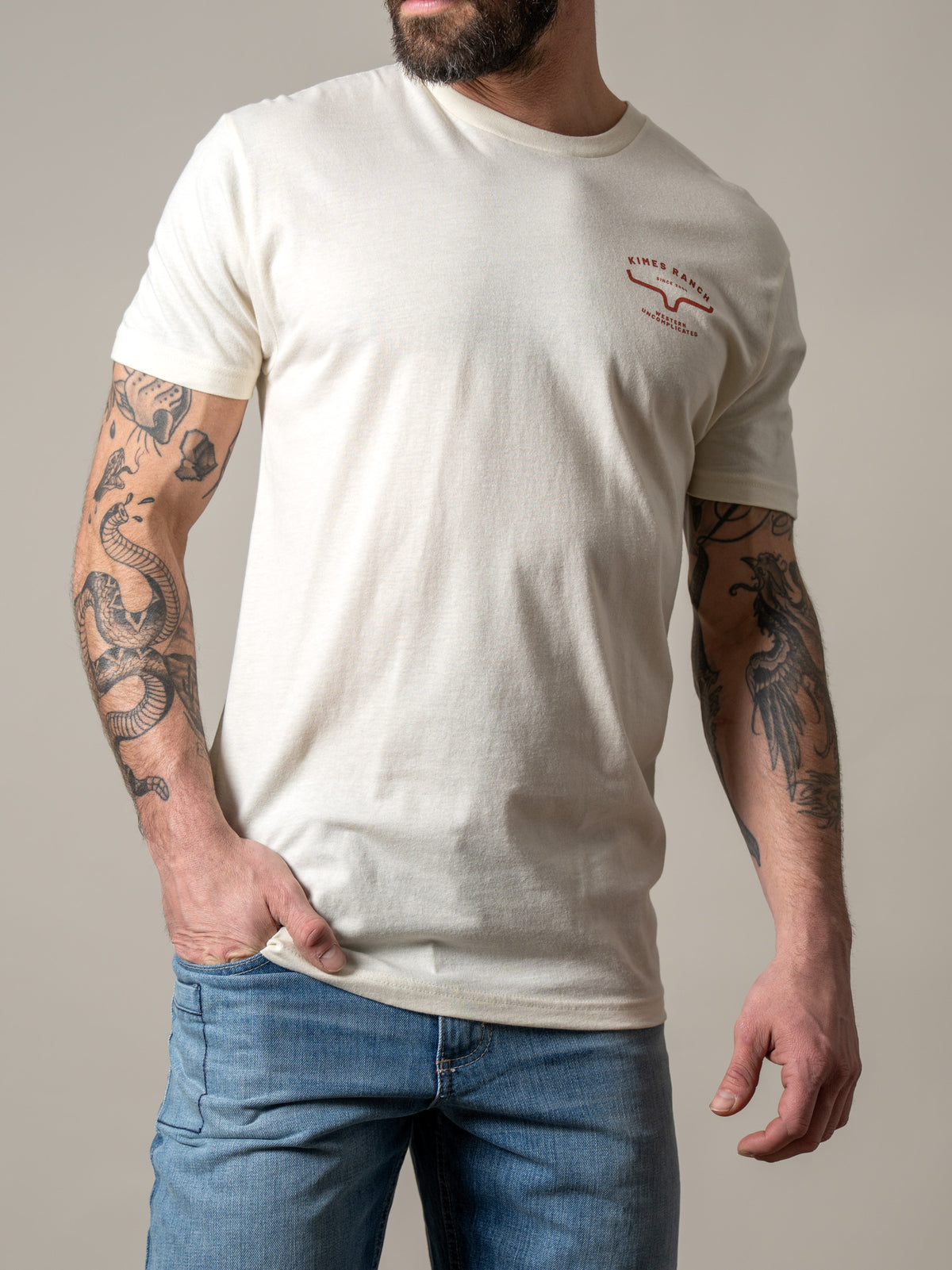 Kimes Ranch Honor shirt in Natural with a chest logo and short sleeves
