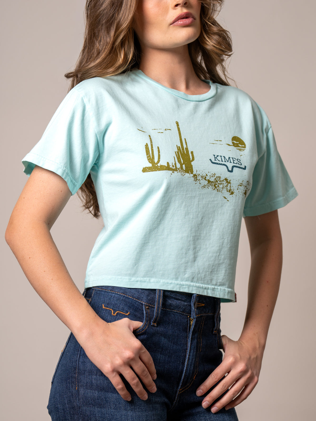 Kimes Ranch Horizon West Mint short sleeve shirt with a gold cactus graphic and Kimes Ranch logo