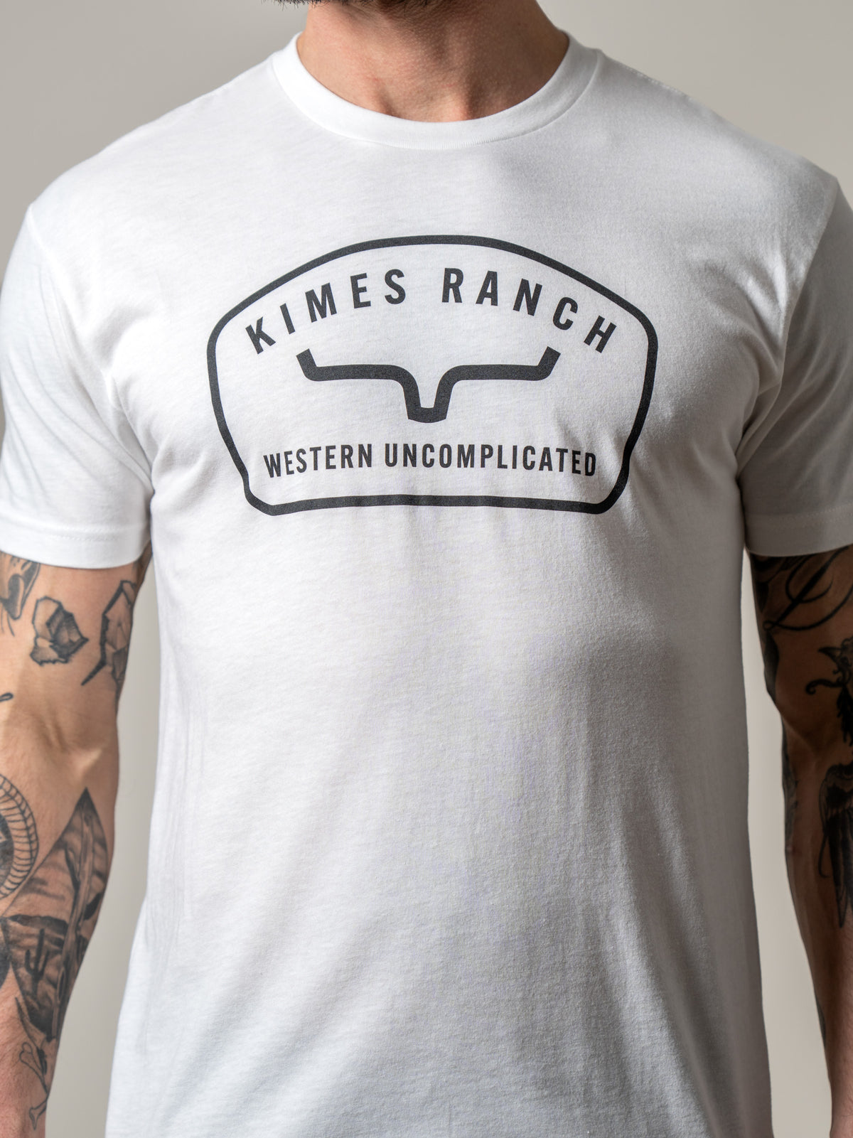 Kimes Ranch Hunton shirt in White with the Kimes Ranch logo and Western Uncomplicated text