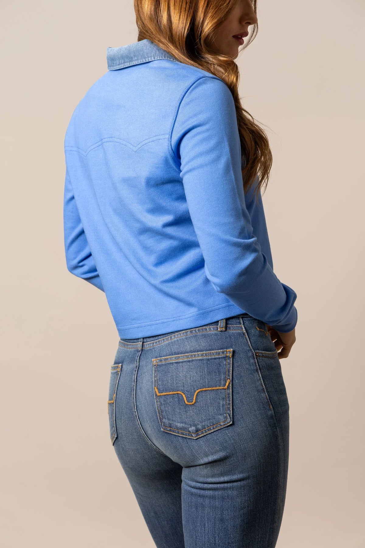 Kimes Ranch Jamila Rugby top in Marine Blue, side view, with long sleeves and a back yoke