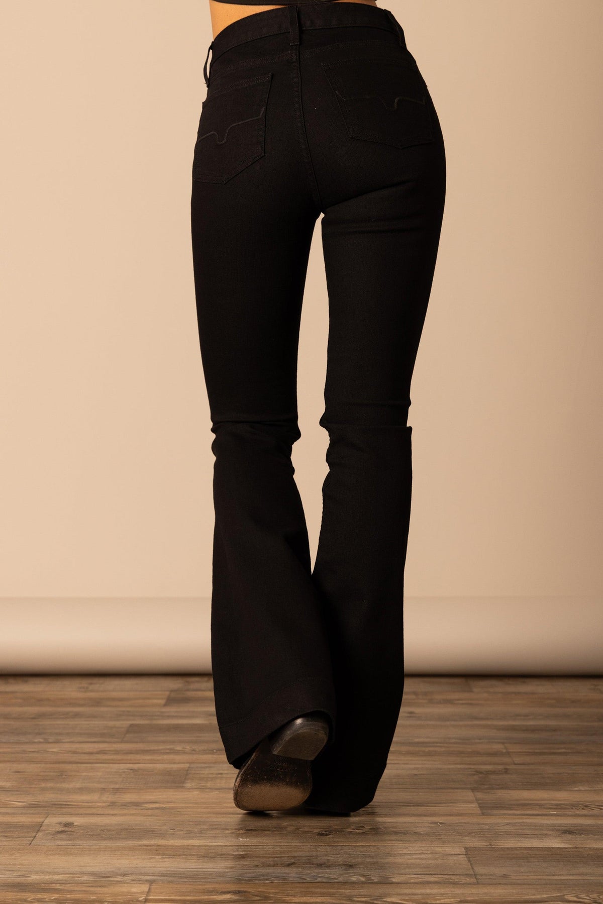 Kimes Ranch Jennifer jeans in Black, back view, with back pockets and a flared leg silhouette