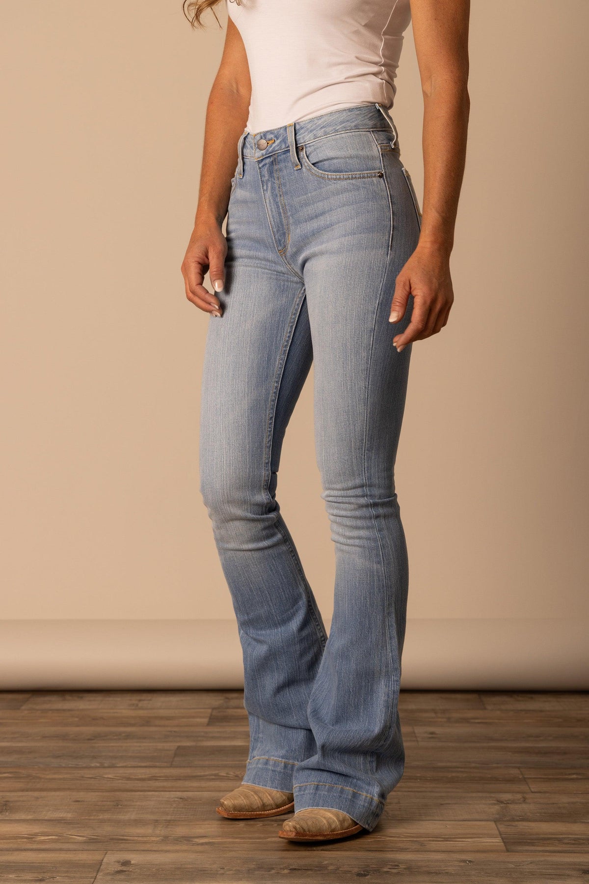 Kimes Ranch Jennifer jeans in Light Wash, side view, with a flared leg and classic five-pocket styling