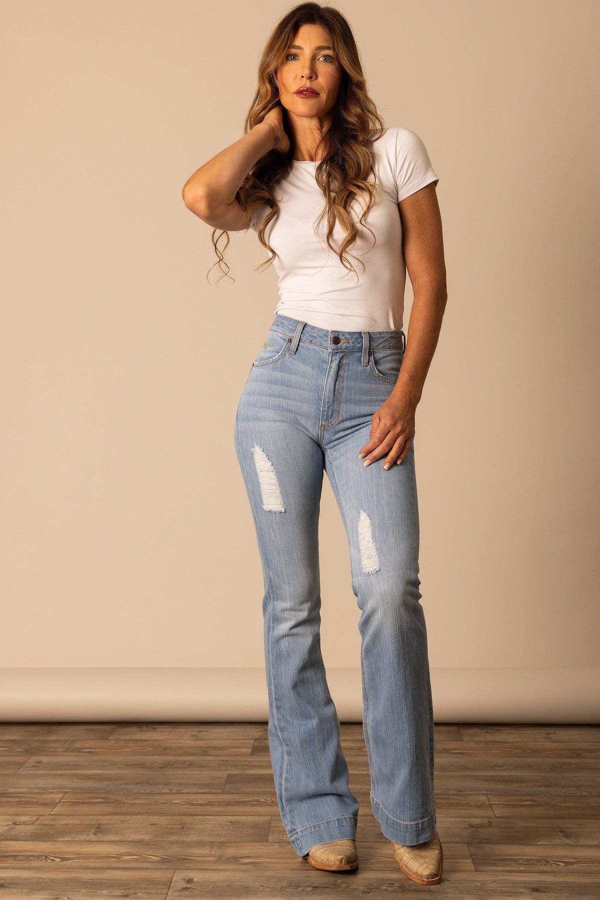 Kimes Ranch Jennifer jeans in Sugar Fade with distressed knees and a bootcut leg