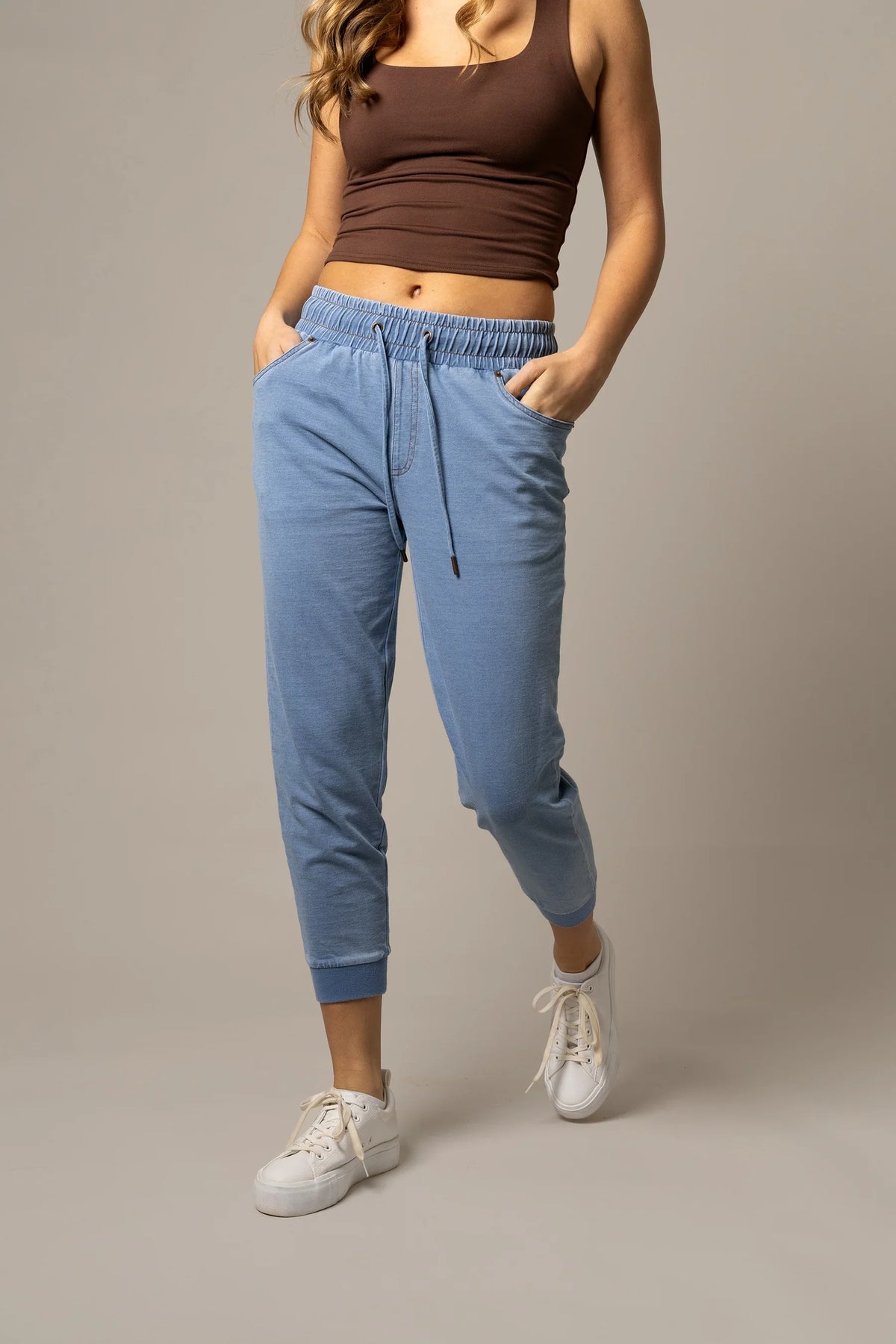 Kimes Ranch Joanie pants in Light Wash Indigo with an elastic waistband, drawstring, and front pockets