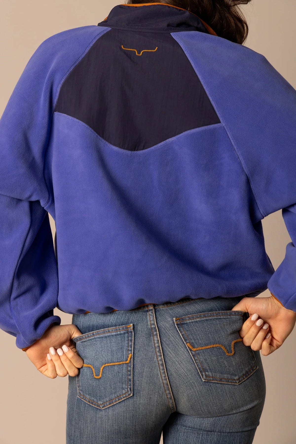 Kimes Ranch Josie Fleece sweatshirt in Blue, back view, with navy back yoke and orange Kimes Ranch logo