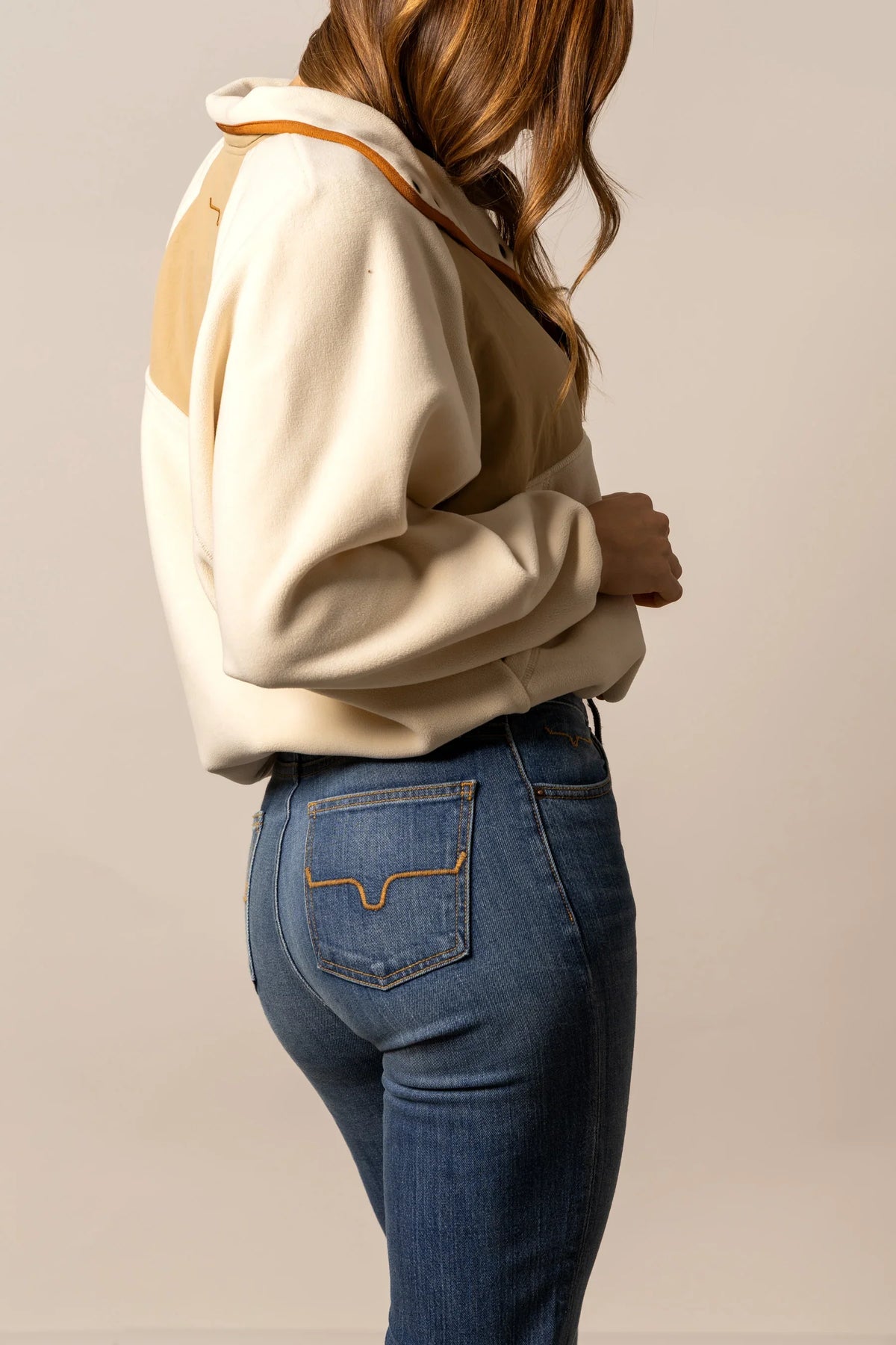 Kimes Ranch Josie Fleece sweatshirt in Natural, side view, with colorblocked tan panels and contrast stitching